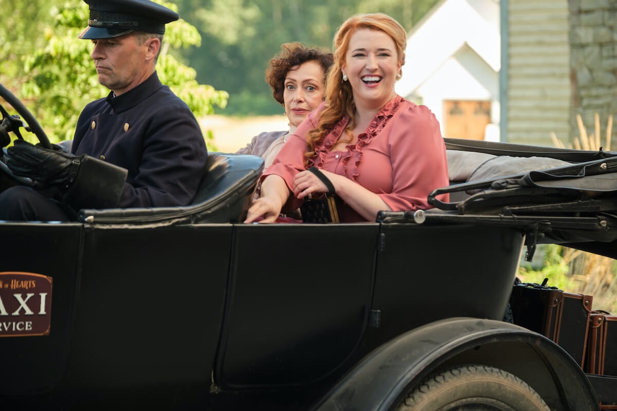 Agatha and Julie sitting in the back of a car in 'When Calls the Heart' Season 10