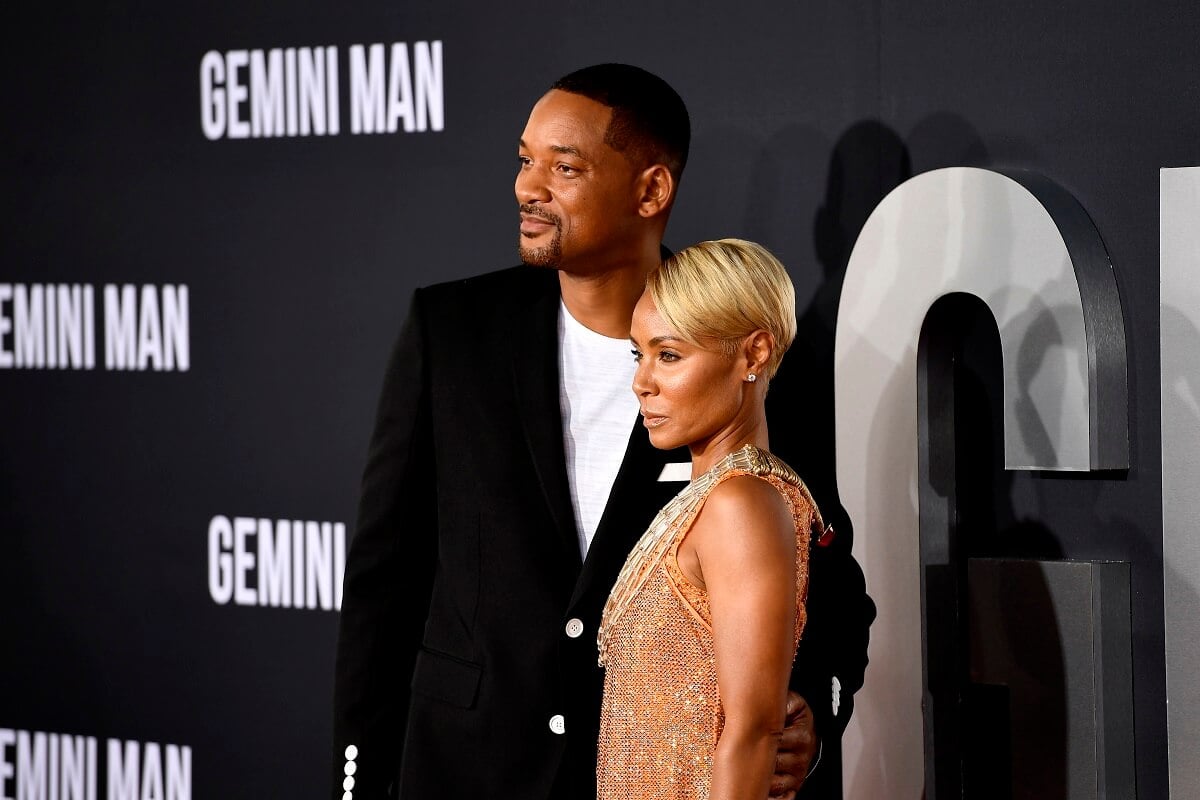Jada Pinkett Smith posing next to Will Smith at the premiere for 'Gemini Man'.