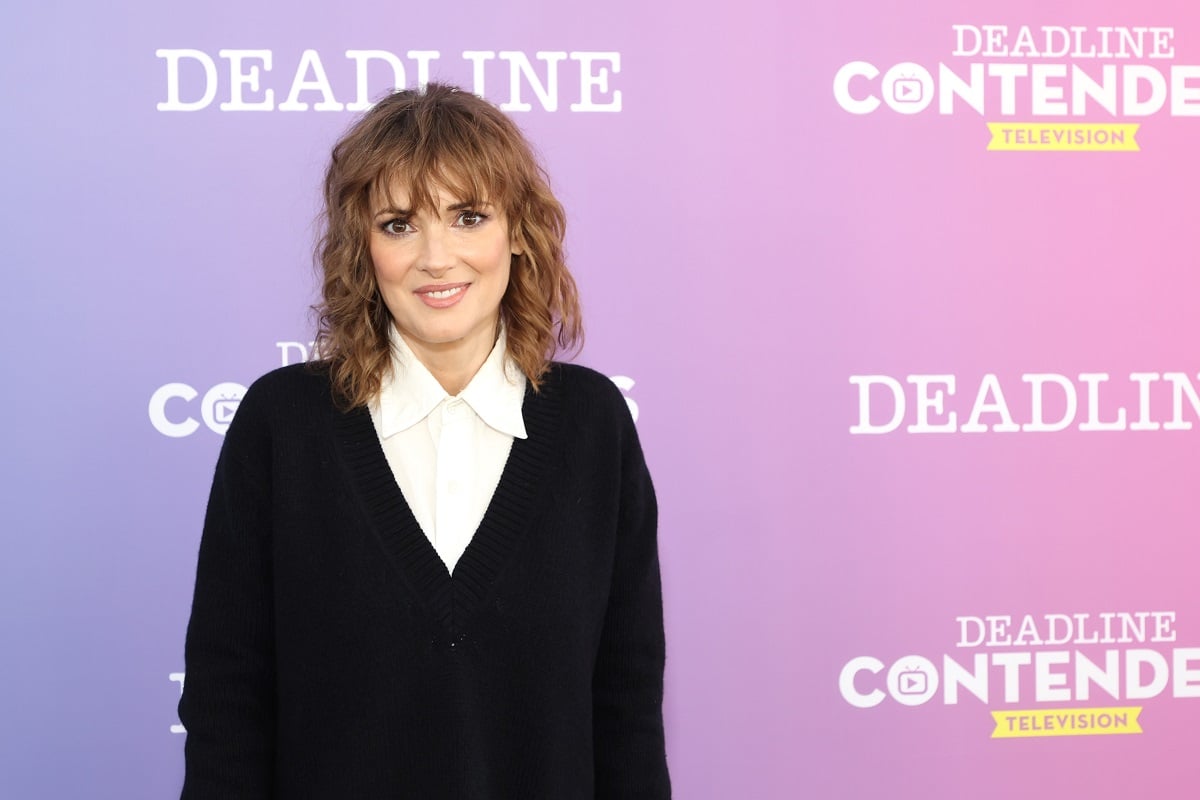 Winona Ryder smiling in a sweater at the Deadline Contenders Television.