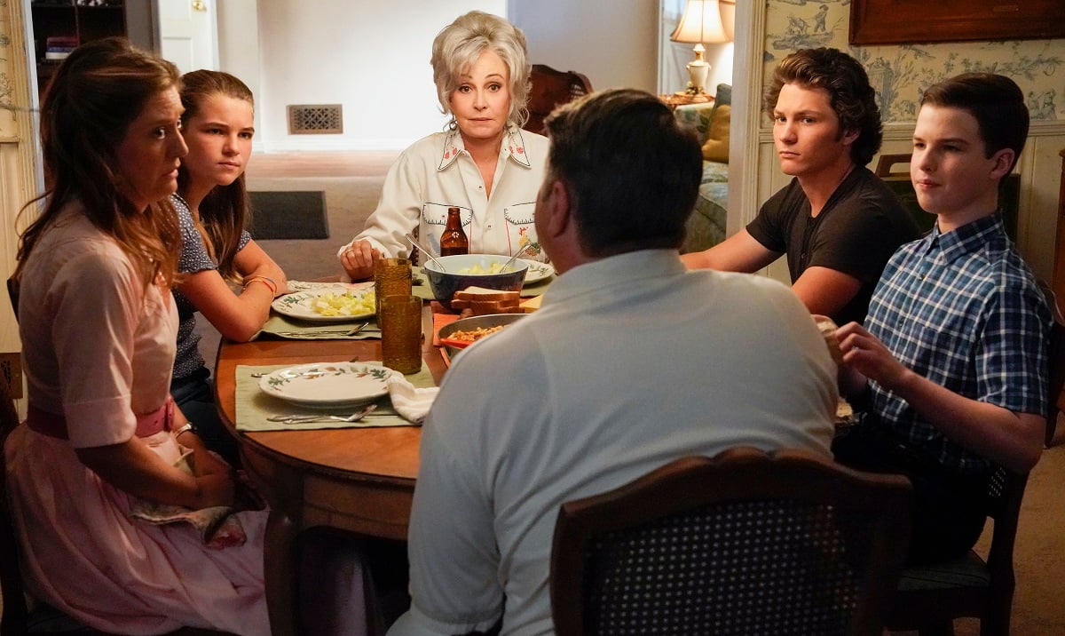 Meemaw is seen at the head of the Cooper family's dining room table in an episode of 'Young Sheldon'