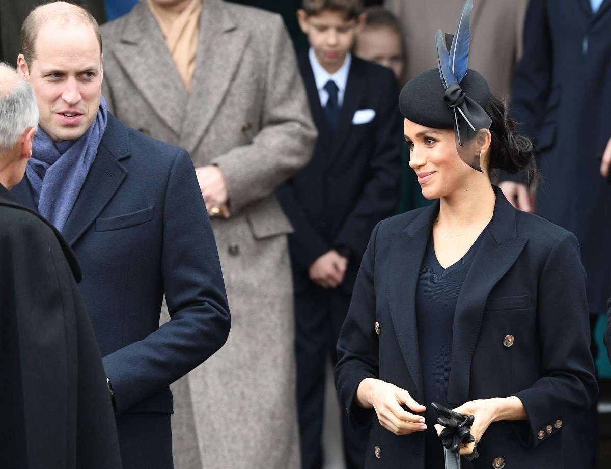 Prince William and Meghan Markle seen ready to depart after the Royal Family's traditional Christmas Day service at St Mary Magdalene Church