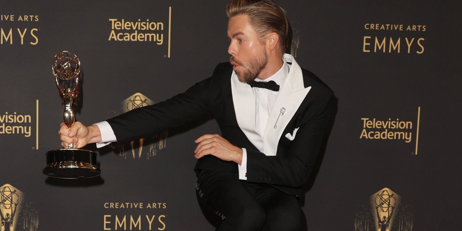 Derek Hough poses with the award for Outstanding Choreography for Variety or Reality Programming for "Dancing With The Stars" at the Creative Arts Emmys at Microsoft Theater on September 12, 2021 in Los Angeles, California.
