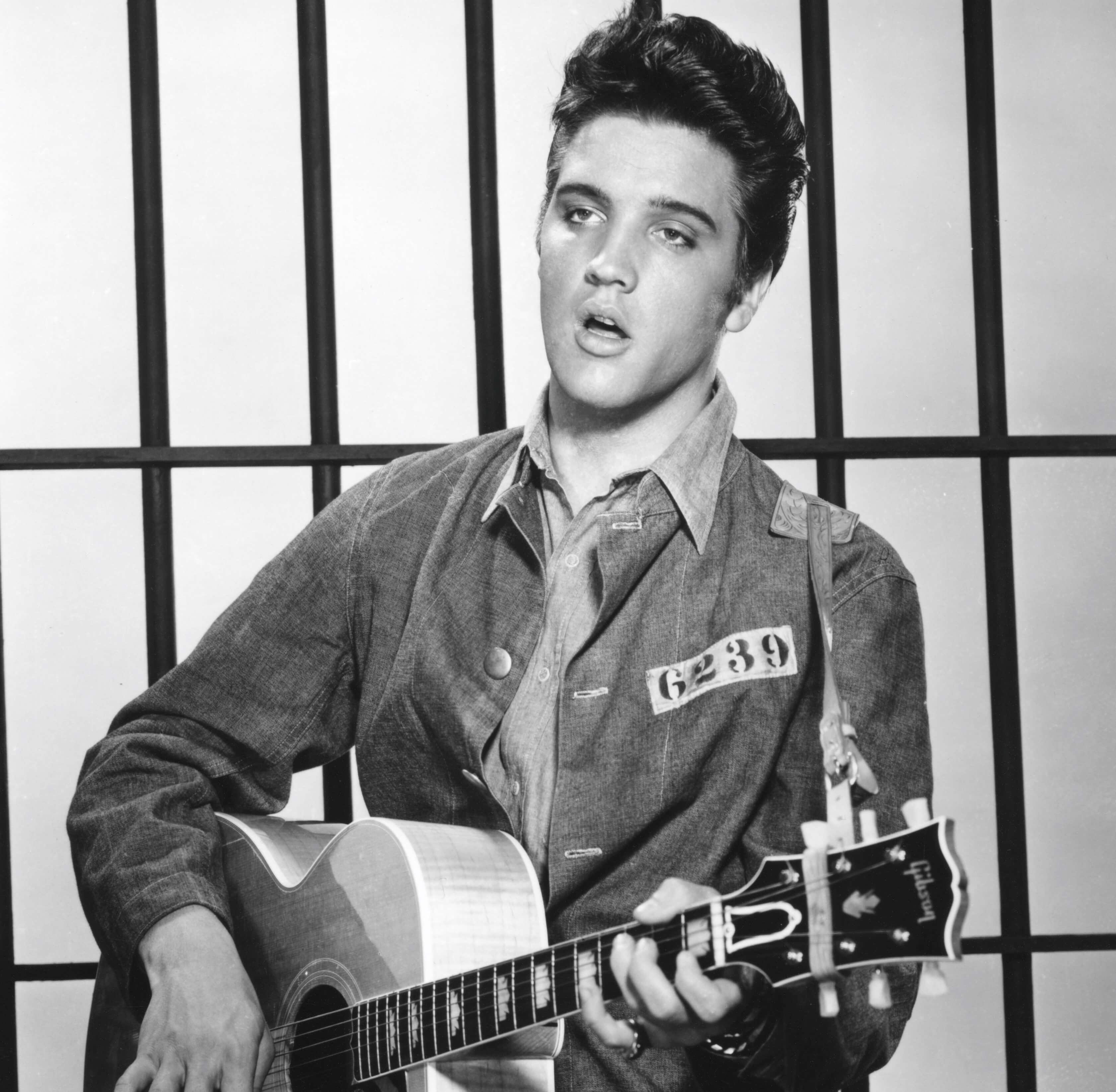 Elvis Presley with a guitar in 'Jailhouse Rock'