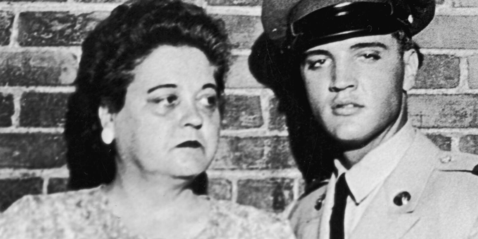 Gladys Presley and Elvis Presley pose in 1958 after he returned home to Graceland from Germany, where he was stationed in the United States Army.