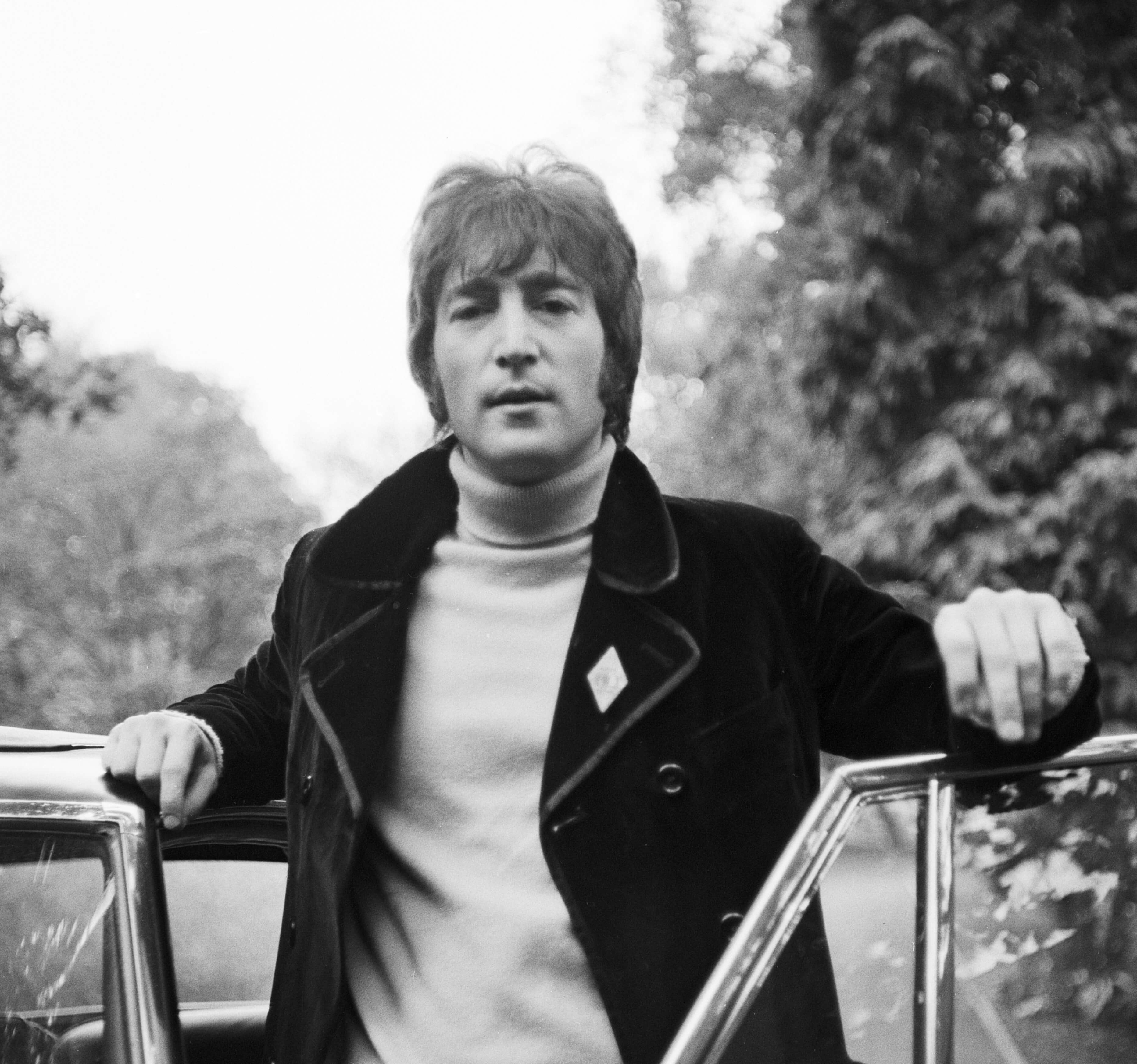 John Lennon and a car