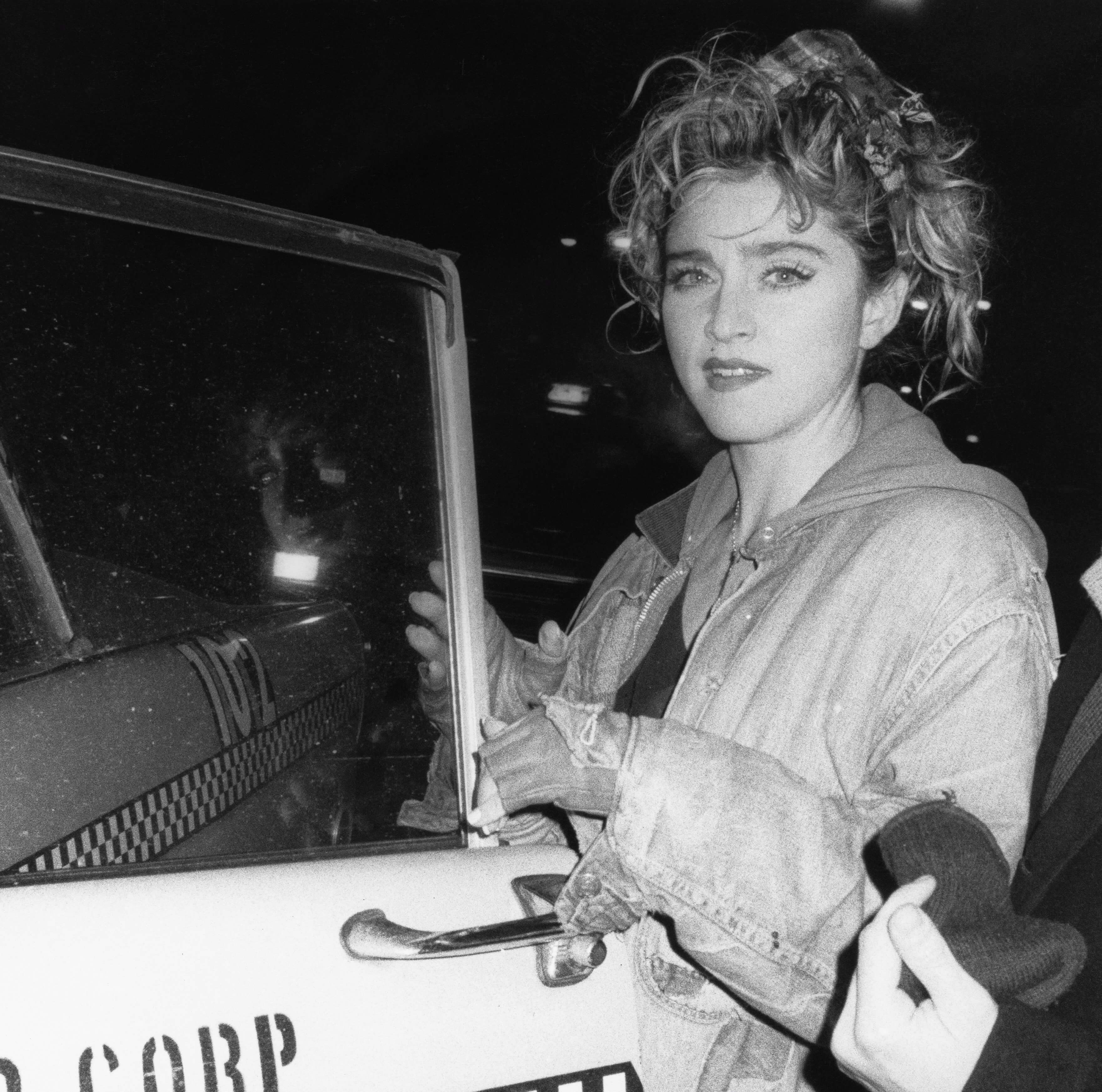 "Dress You Up" singer Madonna and a car