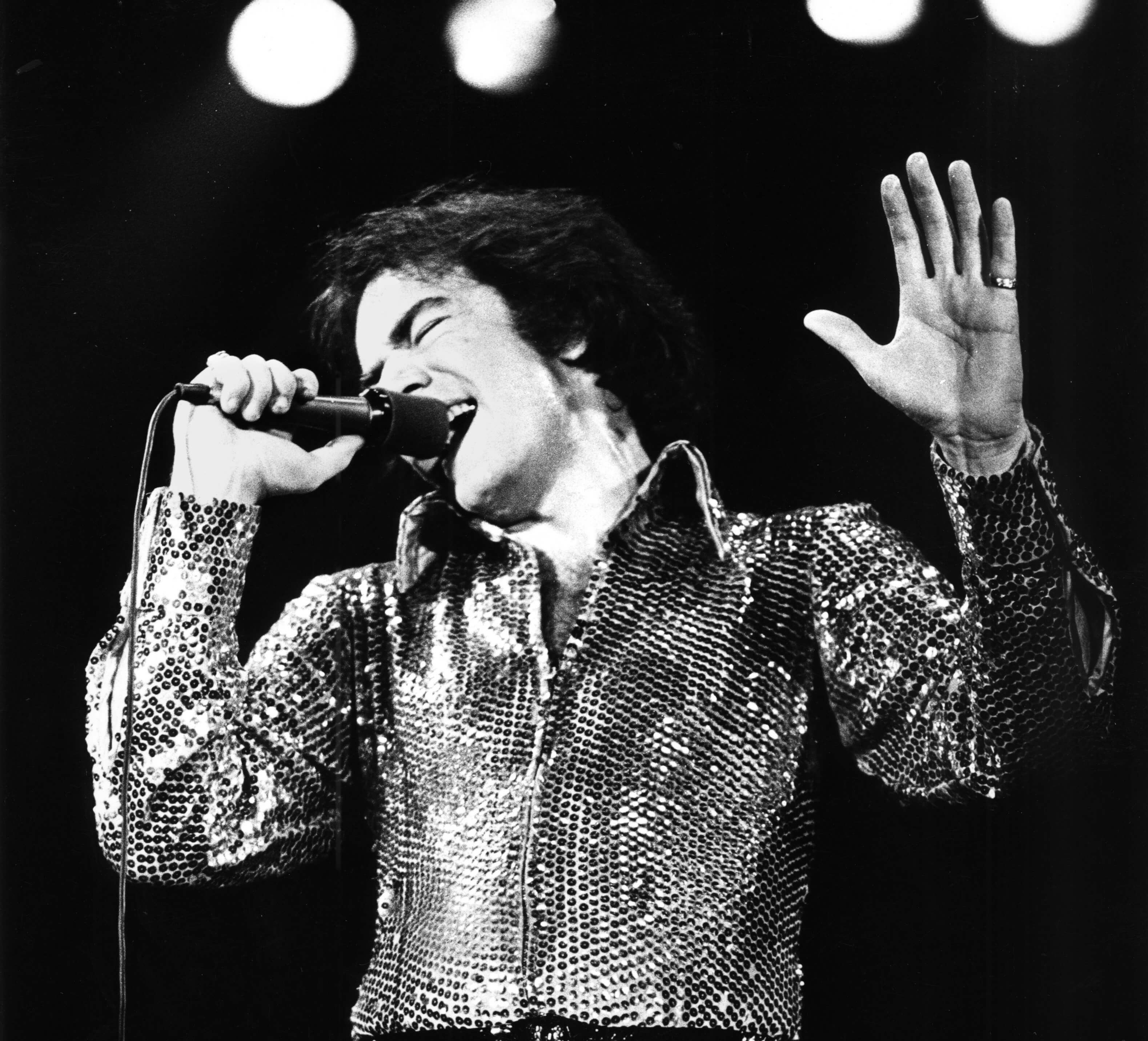 Neil Diamond with a microphone