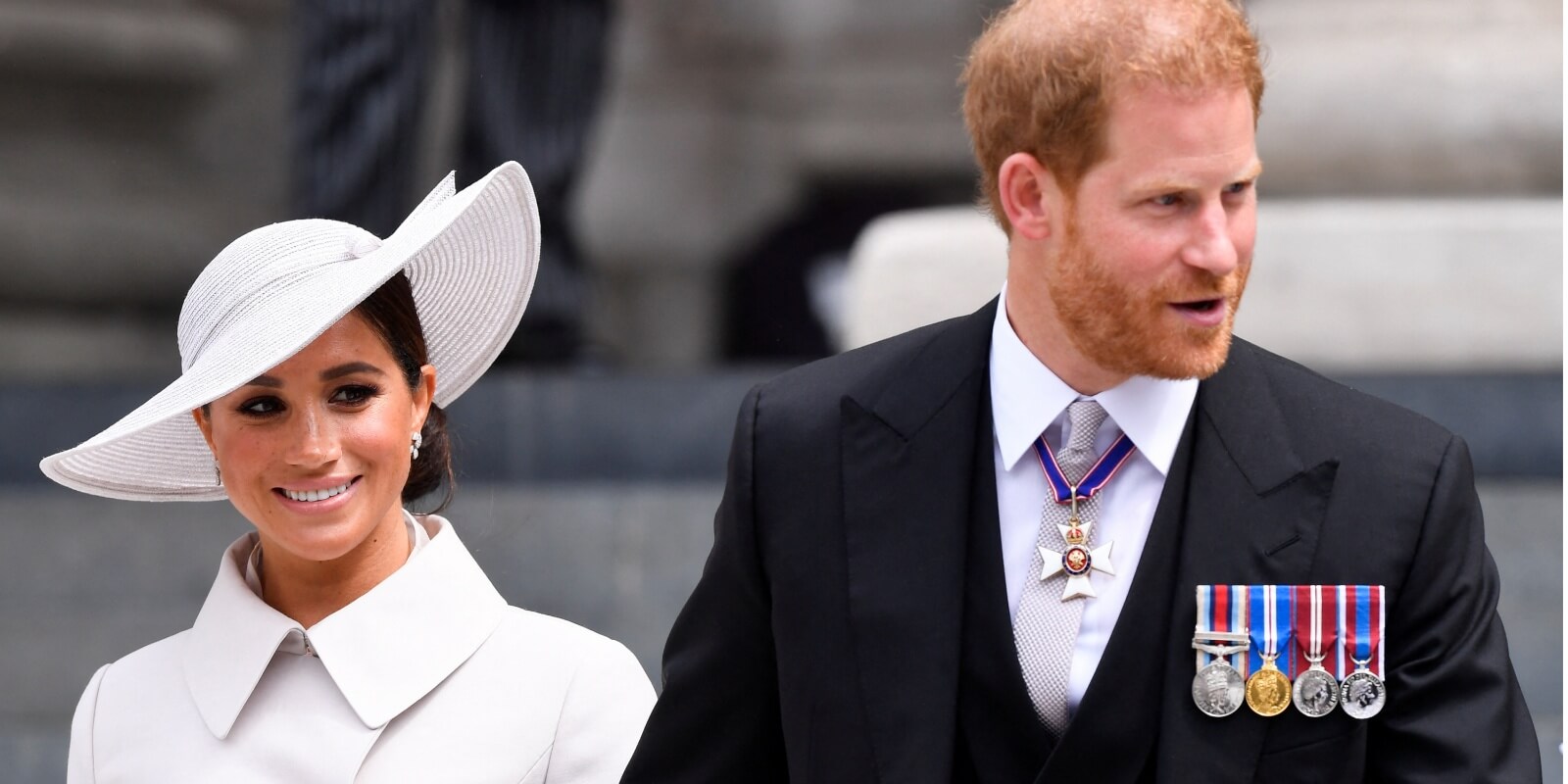 Meghan Markle and Prince Harry hold hands during the National Service of Thanksgiving at St Paul's Cathedral during the Queen's Platinum Jubilee celebrations on June 3, 2022 in London, England.