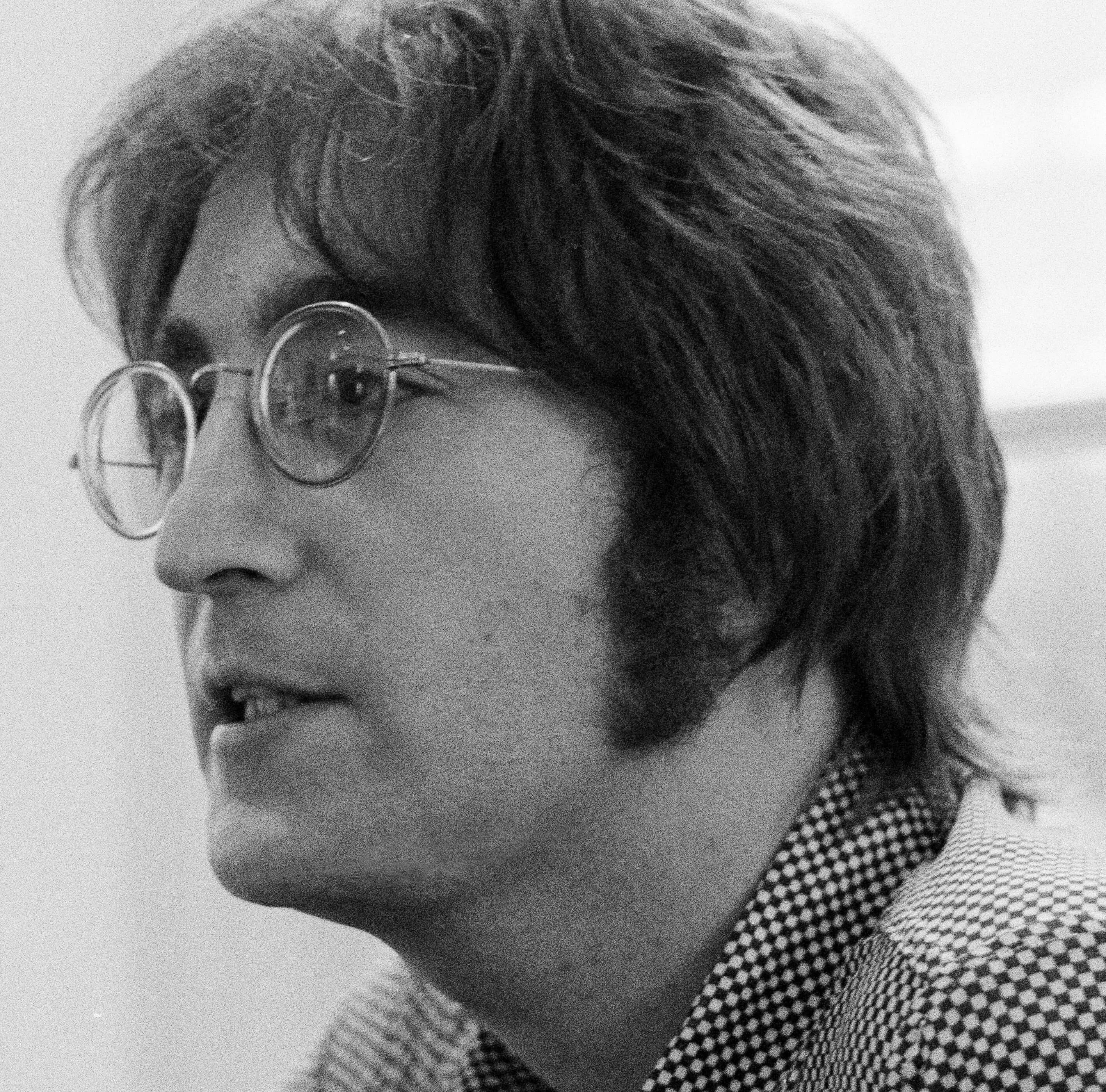 John Lennon in black-and-white during The Beatles' "Revolution" era