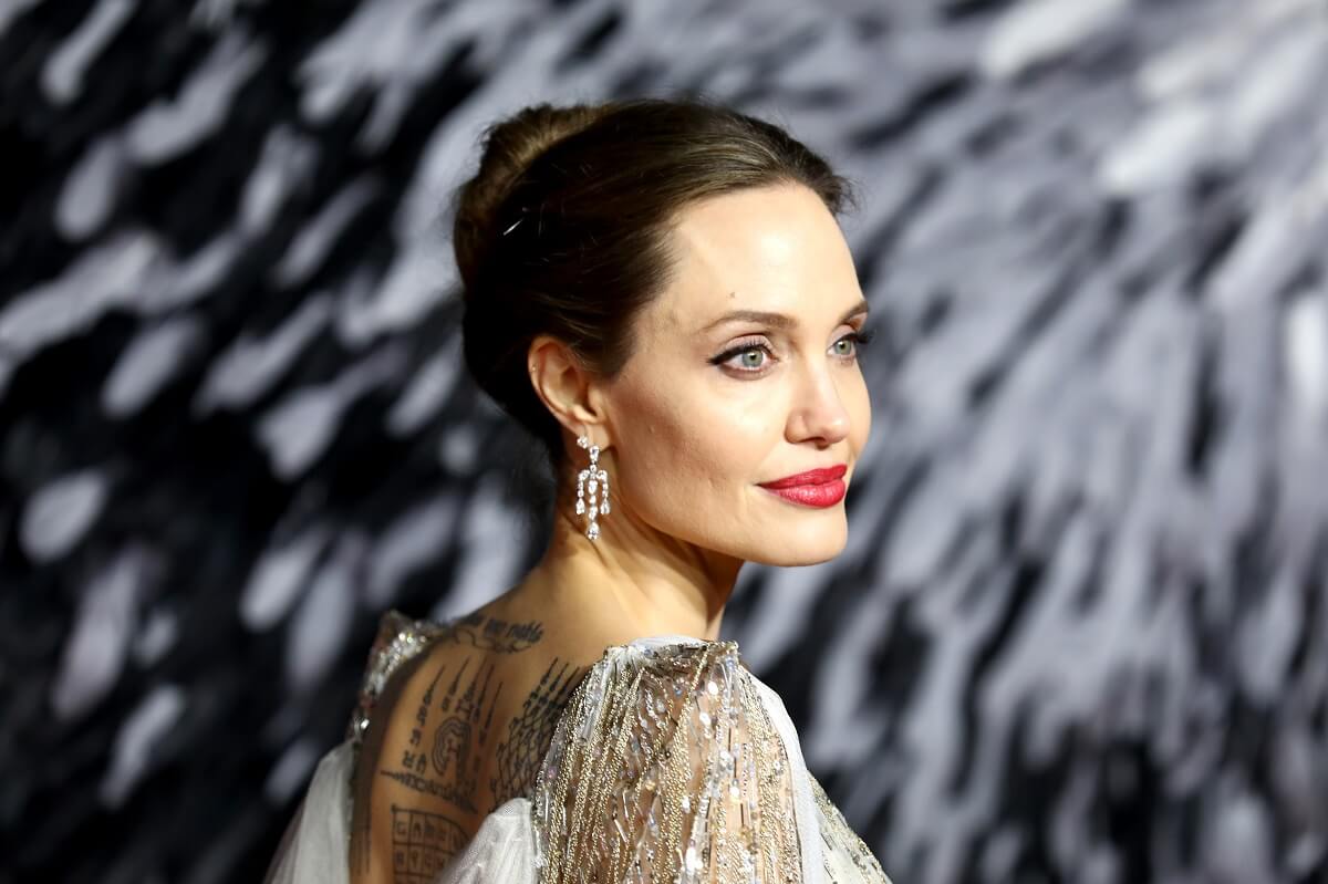 Angelina Jolie looking sideways in a photo taken at the premiere of "Maleficent: Mistress of Evil".
