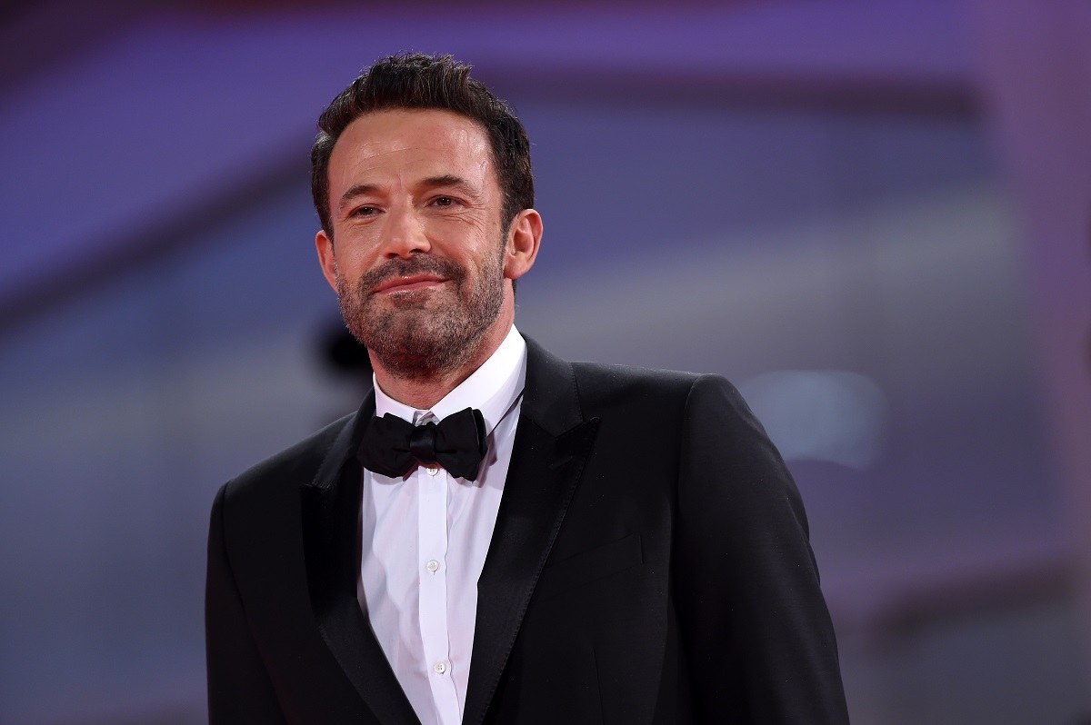 Ben Affleck at 'The Last Duel' red carpet wearing a suit.