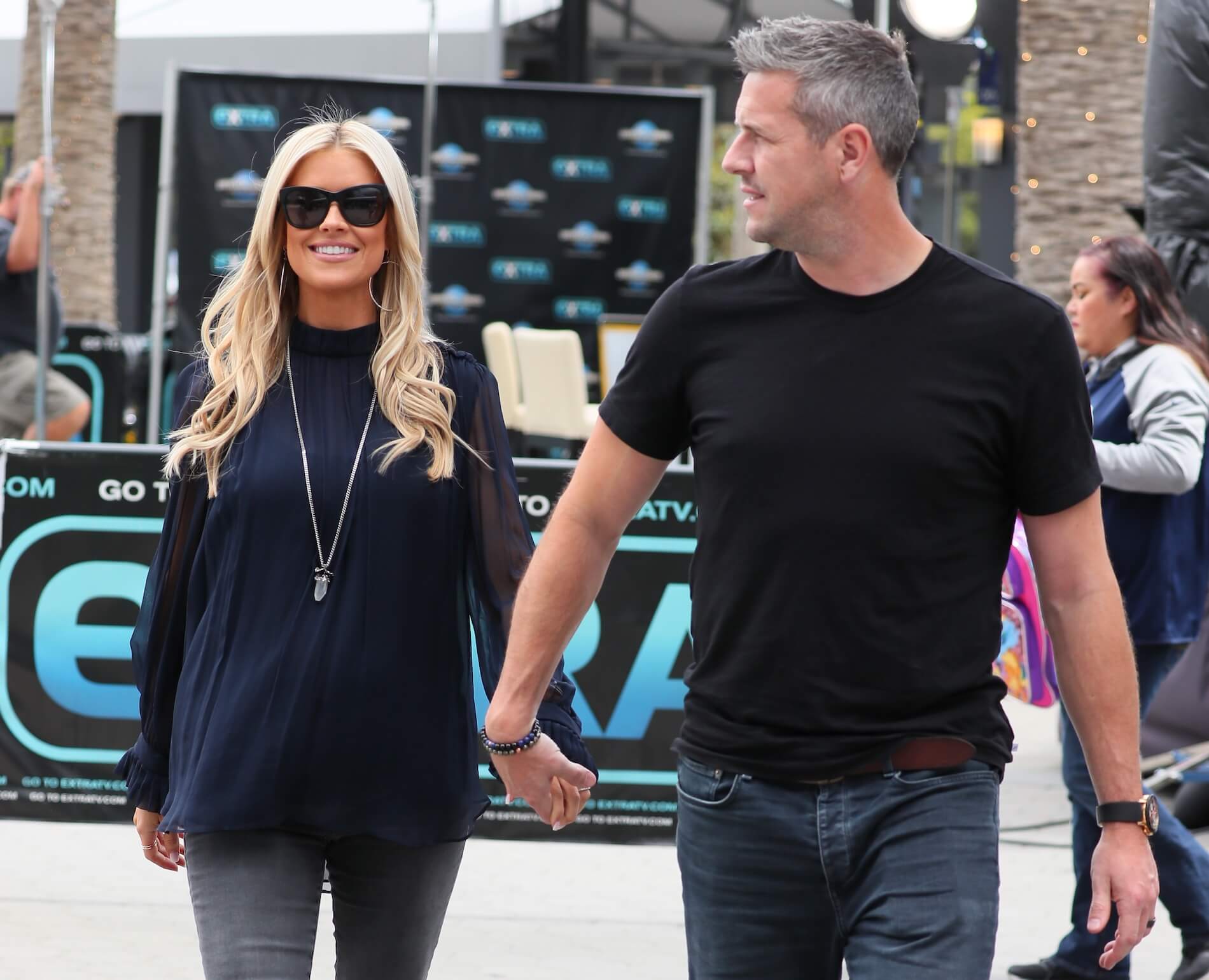 Christina Hall from 'Christina on the Coast' holding hands with Ant Anstead