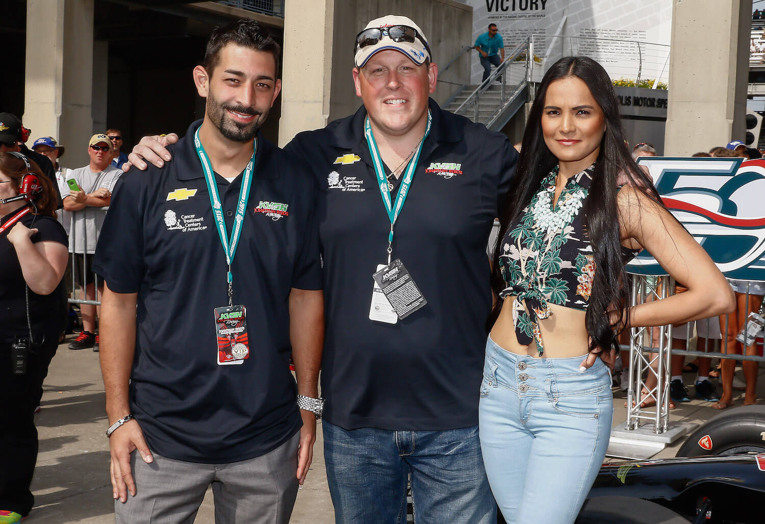 'Deadliest Catch' captains Josh Harris and Casey McManus from the F/V Cornelia Marie next to a woman while at the Indy 500