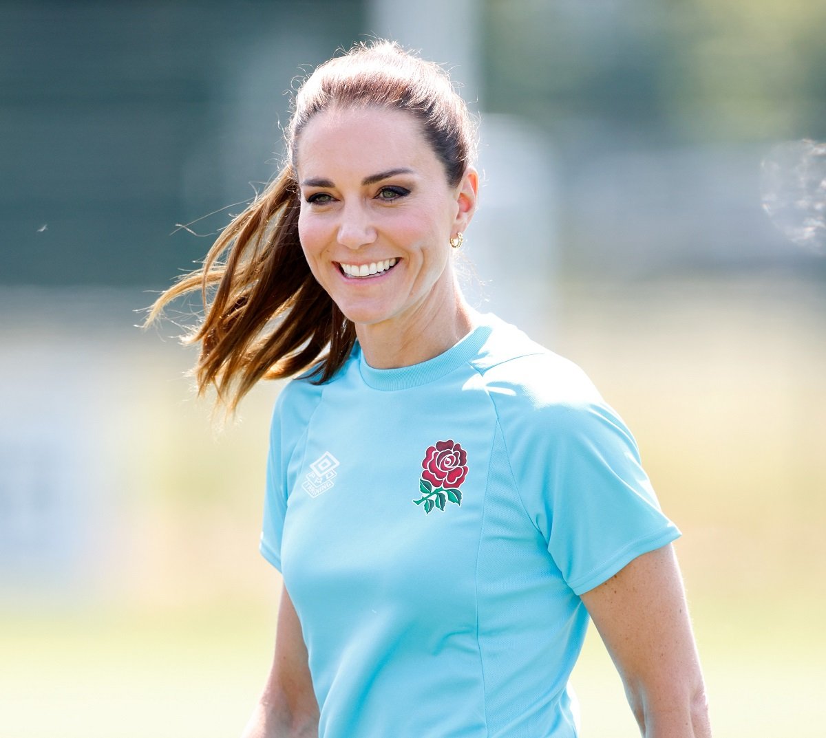 Kate Middleton takes part in a game of walking touch rugby as she visits Maidenhead Rugby Club
