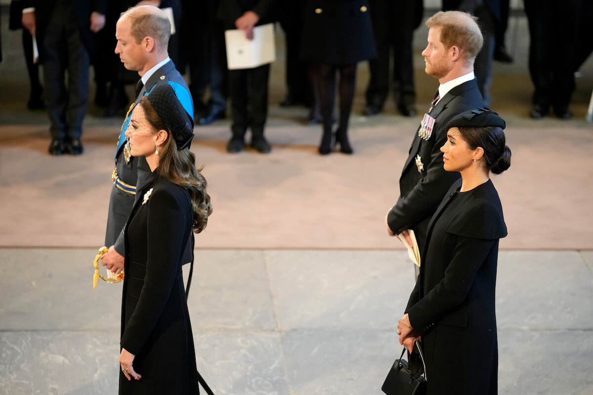 Kate Middleton, the one person 'helping' the rift between Princes William and Harry, stands with the brothers and Meghan Markle