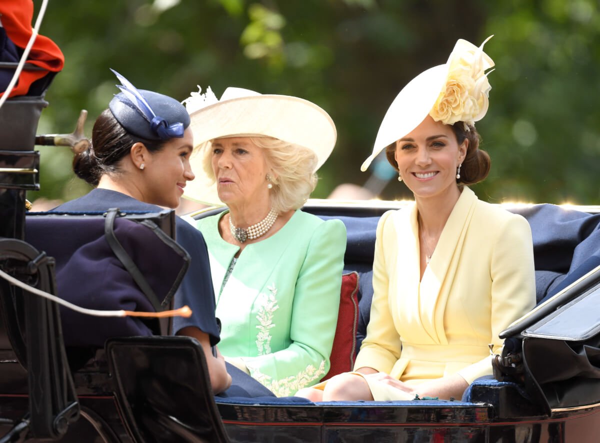 Meghan, Duchess of Sussex, Camilla, Duchess of Cornwall and Catherine, Duchess of Cambridge attend Trooping The Colour, the Queen's annual birthday parade, on June 08, 2019 in London, England
