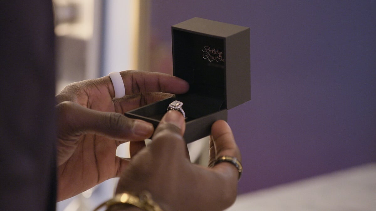 Man holding an engagement ring in a box in Netflix's 'Love Is Blind'