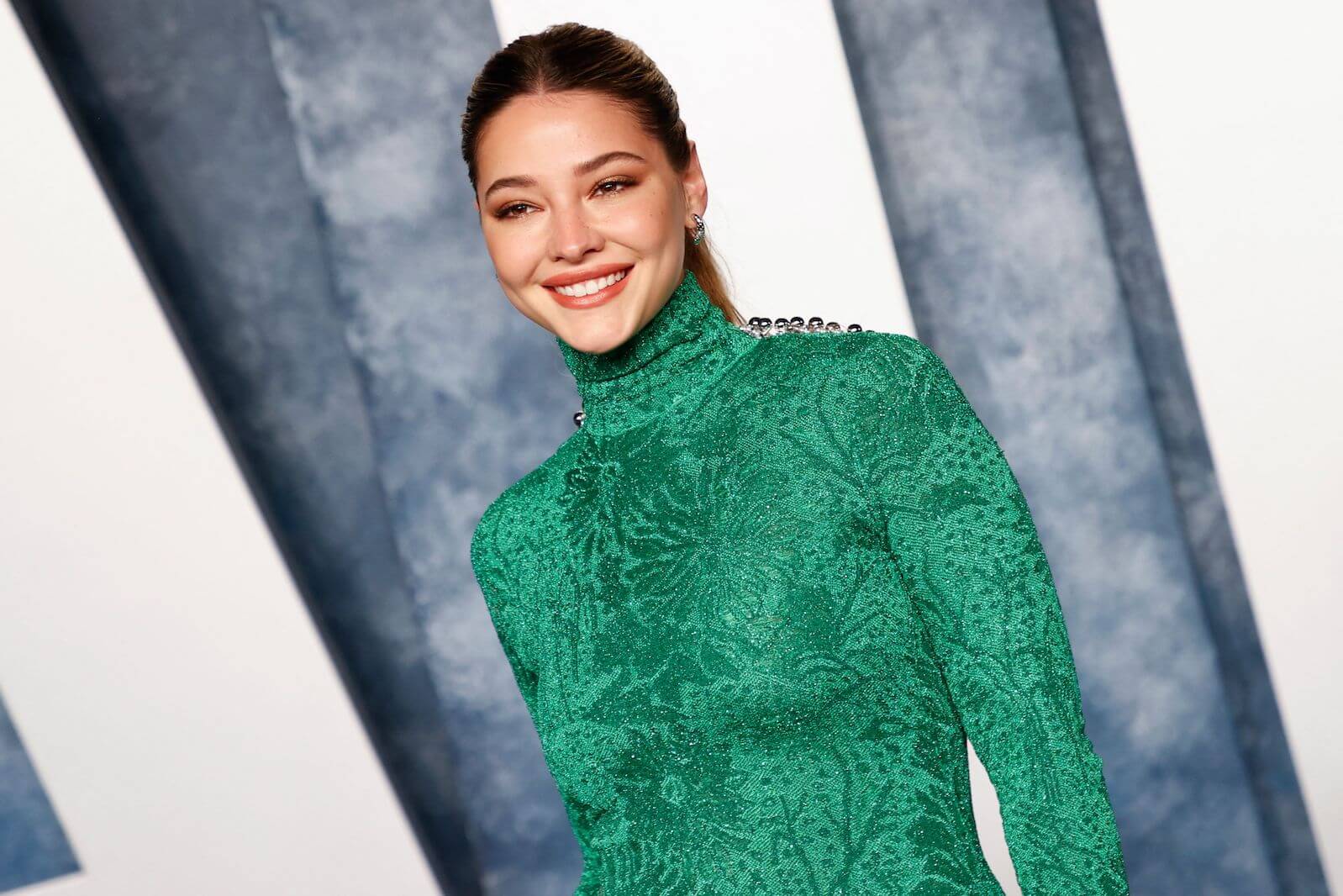 'Outer Banks' star Madelyn Cline in a high-neck green dress at an event