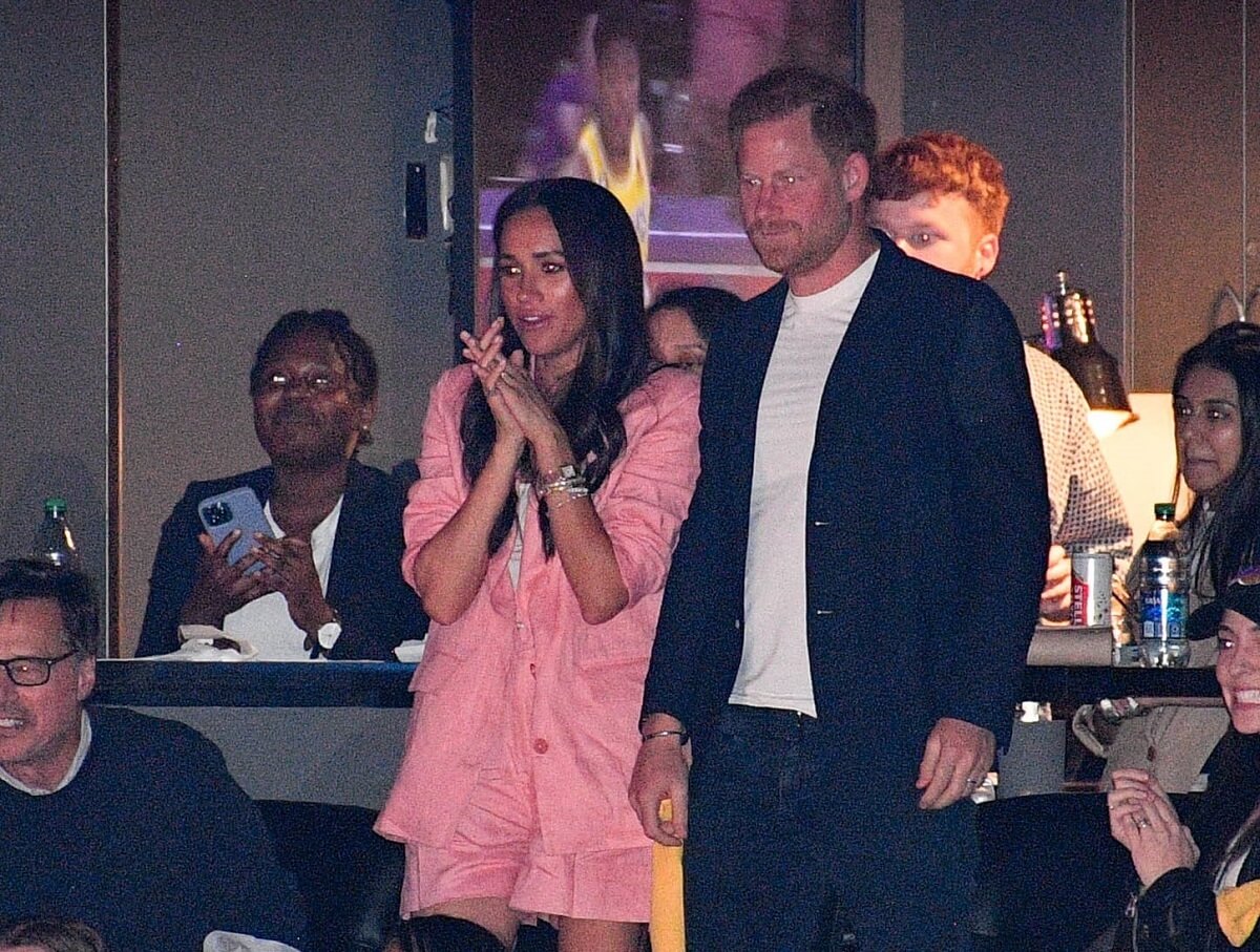 Meghan Markle and Prince Harry, who an expert says we're witnessing the 'beginning of the end' of their Hollywood ambitions, attend a NBA game at Crypto.com Arena