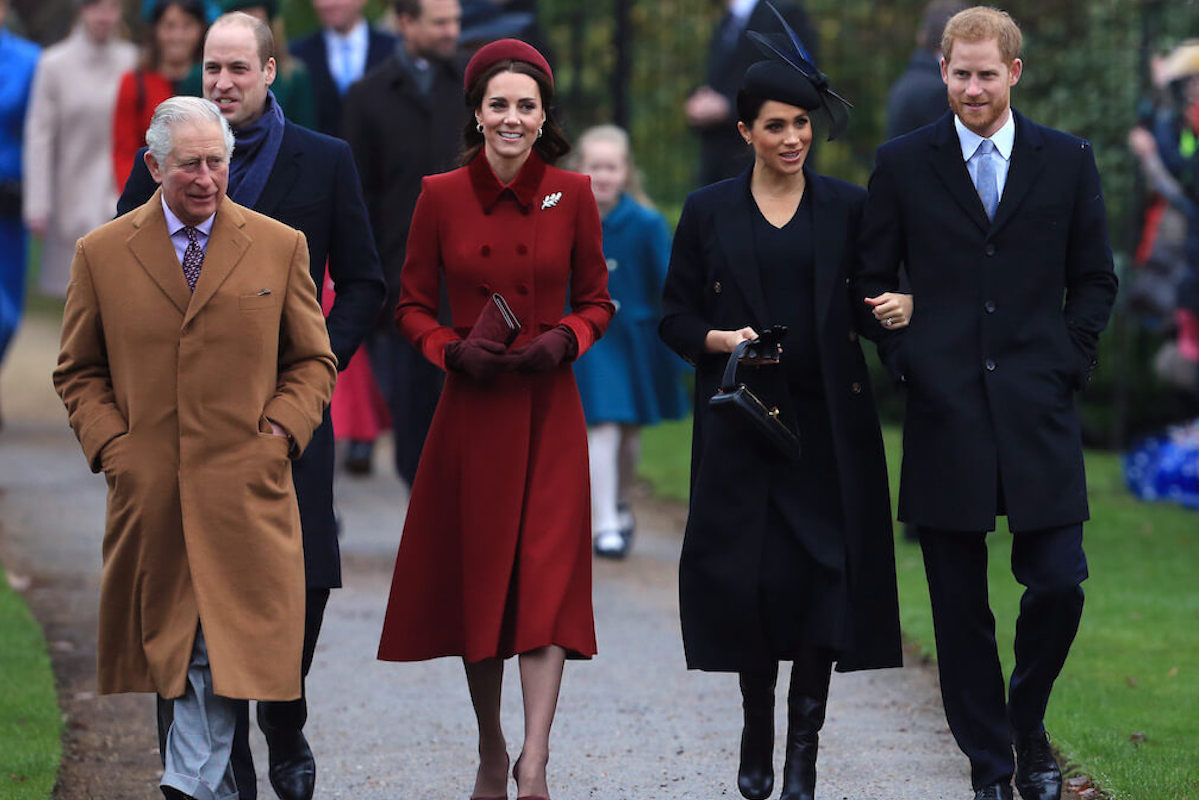Meghan Markle, whose 42nd birthday 'snub' by the royal family only highlighted the 'rift,' per a commentator, walks with King Charles III, Prince William, Kate Middleton, and Prince Harry