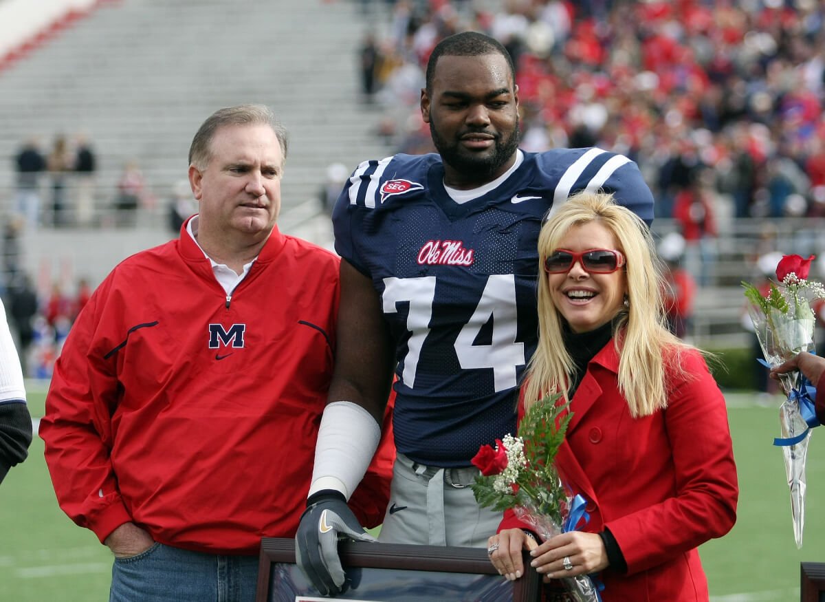 Michael Oher #74 of the Ole Miss Rebels stands with his family during senior ceremonies prior to a game against the Mississippi State Bulldogs at Vaught-Hemingway Stadium on November 28, 2008 in Oxford, Mississippi