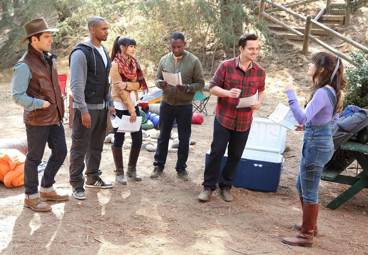 Schmidt, Coach, Cece, Winston, Nick and Jess of 'New Girl' stand together while camping in a season 3 episode.