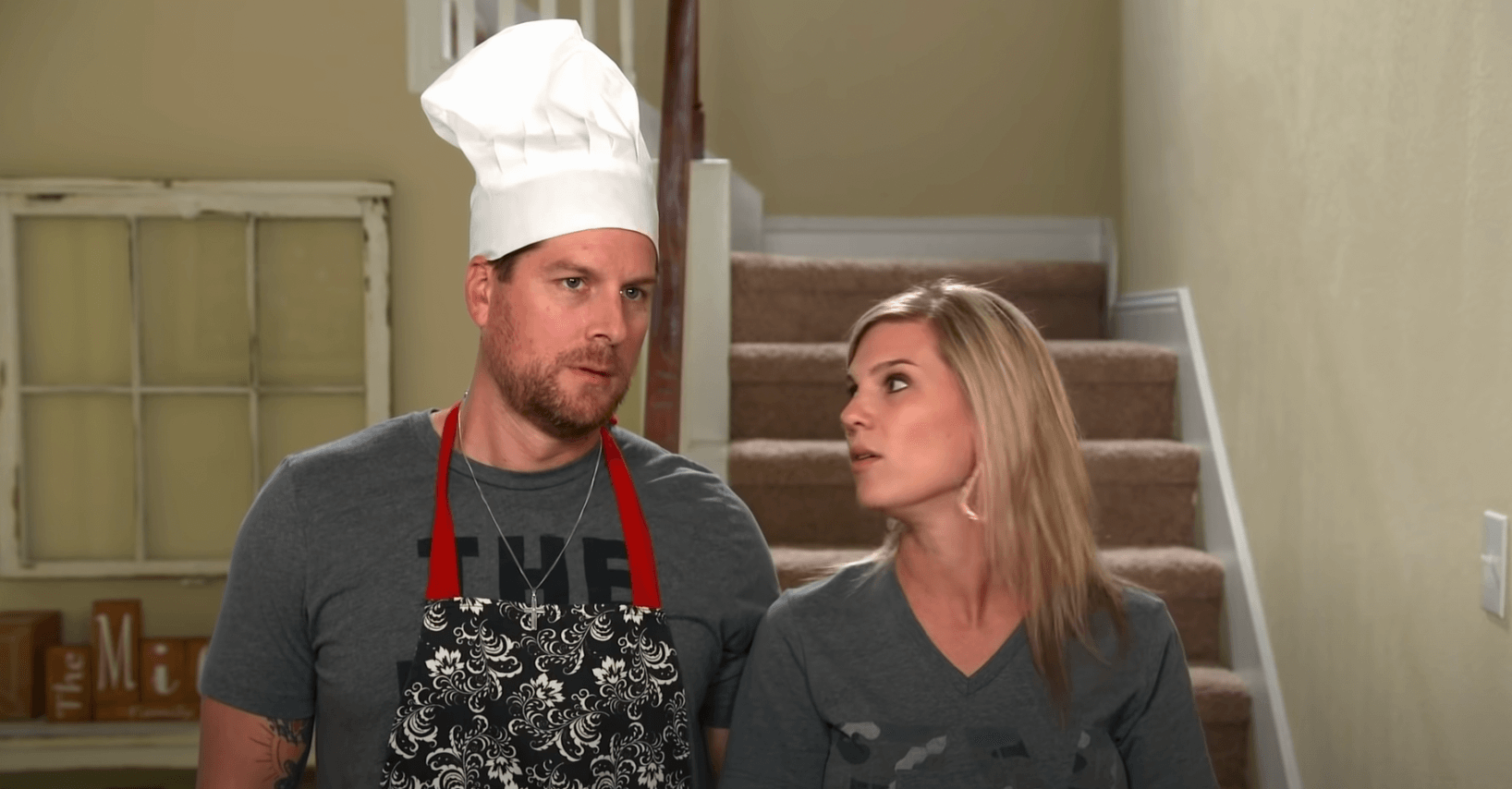 'OutDaughtered' star Uncle Dale and Aunt KiKi standing next to each other. Dale is wearing a chef's hat.