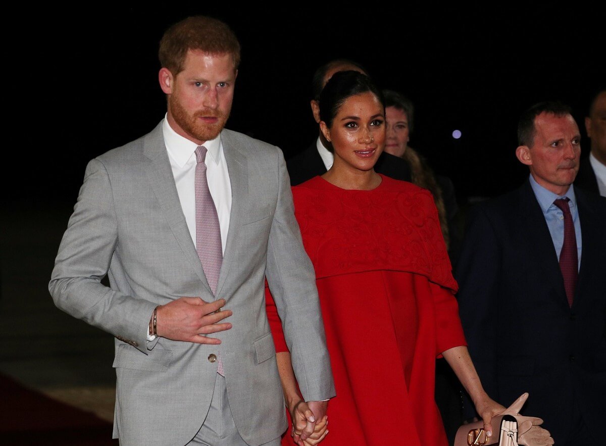 Prince Harry and Meghan Markle, whose body langauge was analyzed after she left red carpet without her husband, are welcomed at Casablanca Airport