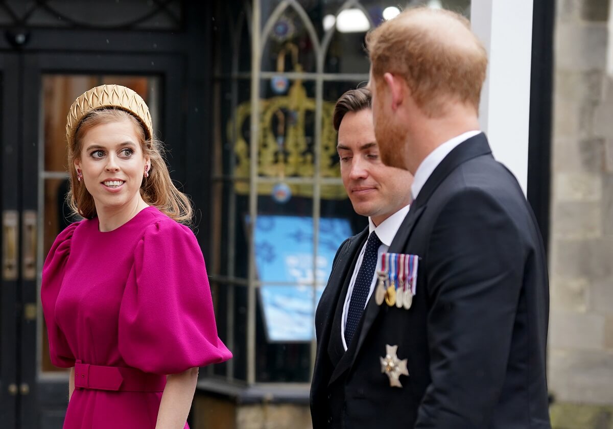 Prince Harry arriving with Princess Beatrice and Edoardo Mapelli Mozzi at the Coronation of King Charles III
