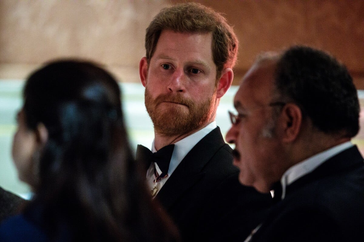 Prince Harry, who a body langauge says gets 'anxious,' but is more confident without Meghan, attends the Queen's Dinner at Buckingham Palace in the week of the 'Commonwealth Heads of Government Meeting'