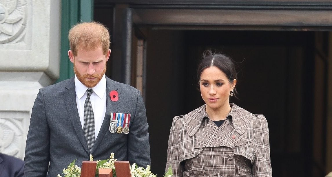 Prince Harry with Meghan Markle, who the duke brought to Princess Diana's gravesite in a remote location, laying a wreath at the National War Memorial