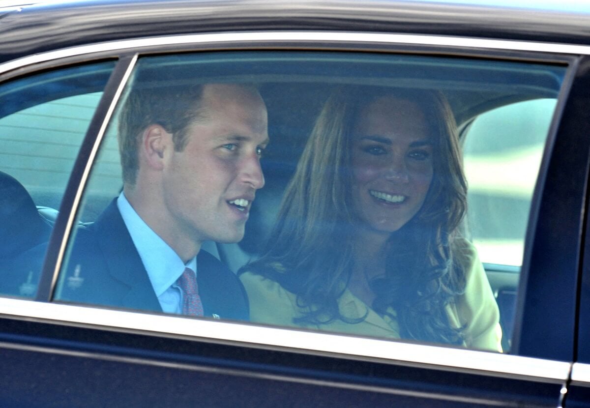 Prince William and Kate Middleton in a car as they leave Calgary International Airport