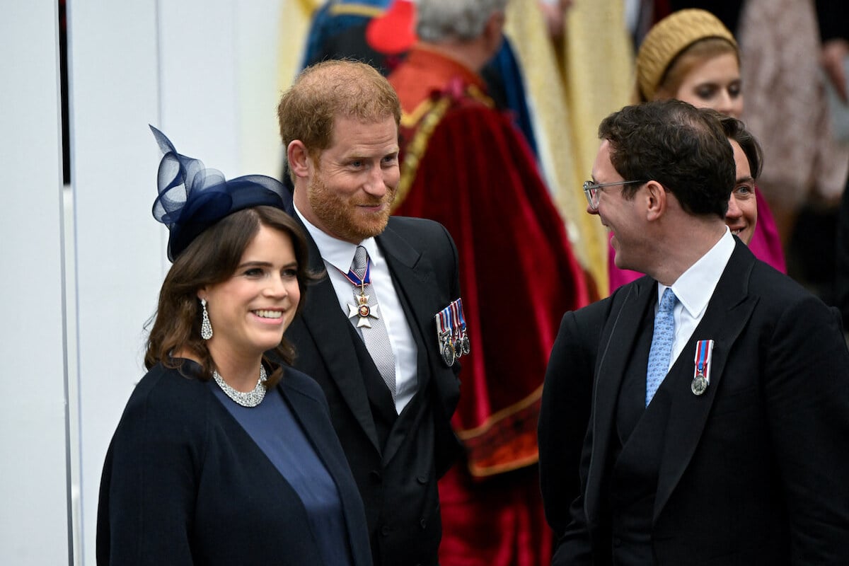 Princess Beatrice, who may heal the royal family rift, stands with Princess Eugenie, Prince Harry, and Jack Brooksbank
