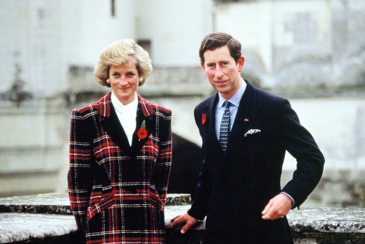 Princess Diana and then-Prince Charles pose outside Chateau de Chambord during their official visit to France