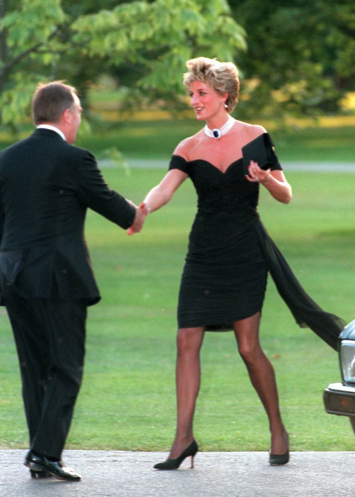 Princess Diana wearing her famous revenge dress to a Vanity Fair party (circa 1994)