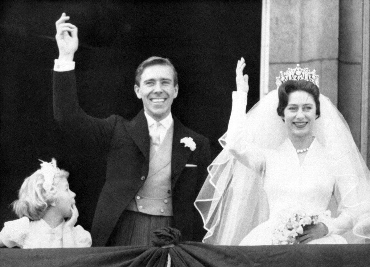 Tony Armstrong-Jones and Princess Margaret wave on the balcony of Buckingham Palace