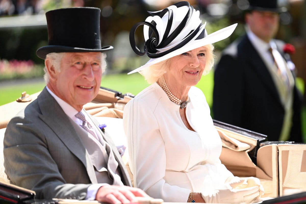 Queen Camilla, whose royal life includes living 'by a spreadsheet,' sits with King Charles III