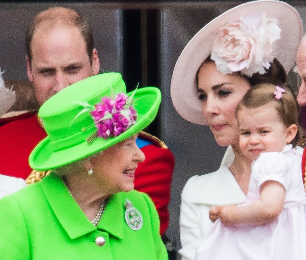 Queen Elizabeth, who changed a rule for Princess Charlotte's title, with Kate Middleton and her daughter on the balcony during the Trooping the Colour in 2016