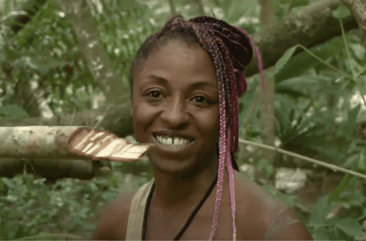 Raven Smith speaks to the cameras while making her shelter on Naked and Afraid
