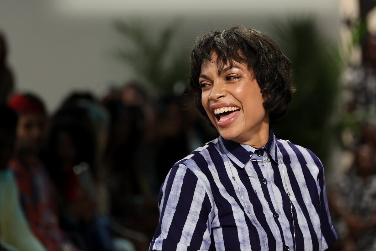 Rosario Dawson smiling at the Studio 189 fashion show.