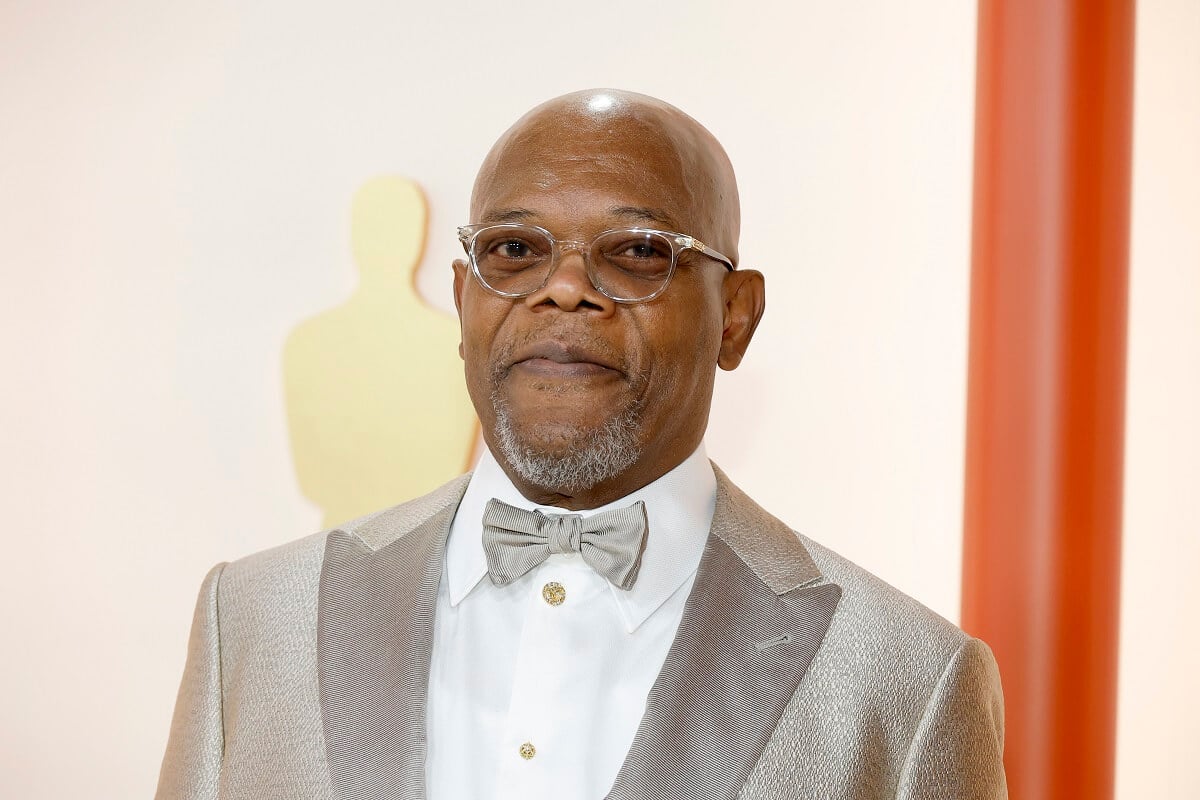 Samuel L. Jackson posing in a suit at the the 95th Annual Academy Awards.