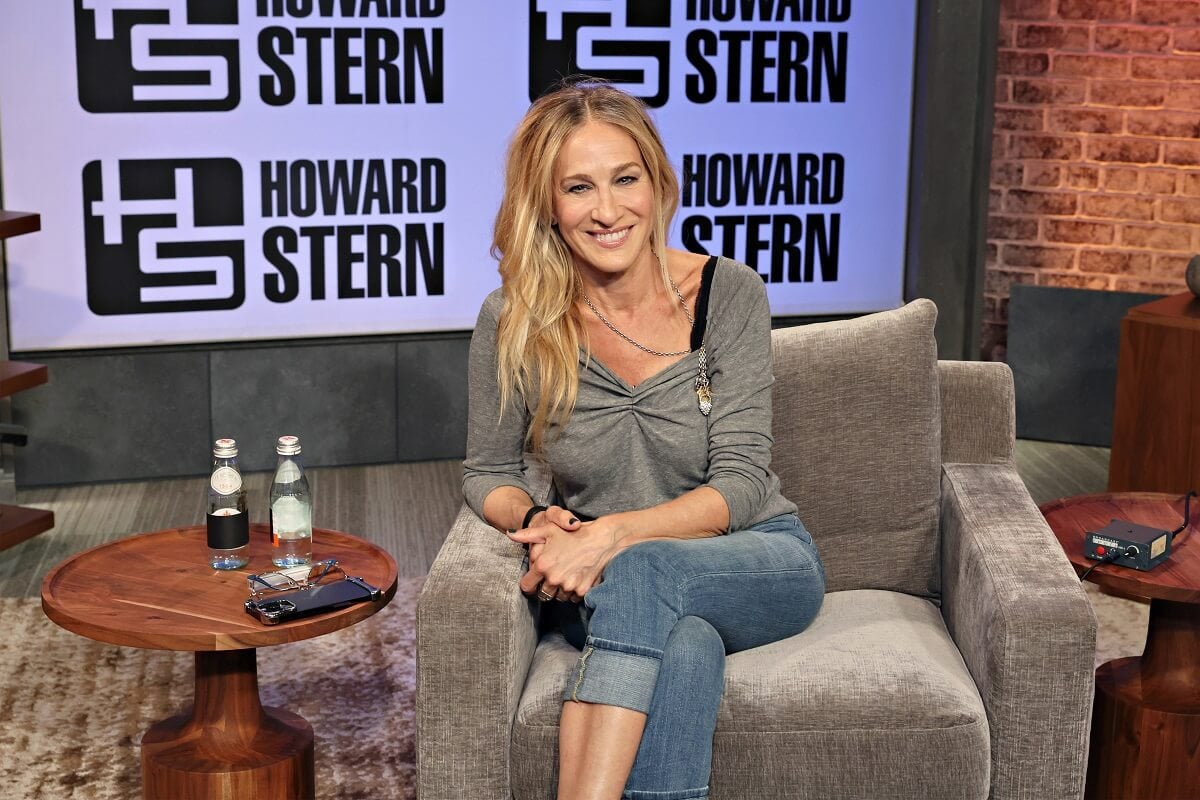 Sarah Jessica Parker sitting down on a chair at 'The Howard Stern Show'.
