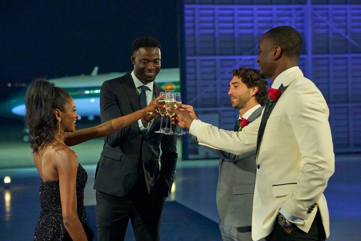 Charity Lawson toasting with Dotun Olubeko, Joey Graziadei, and Xavier Bonner in 'The Bachelorette' 2023