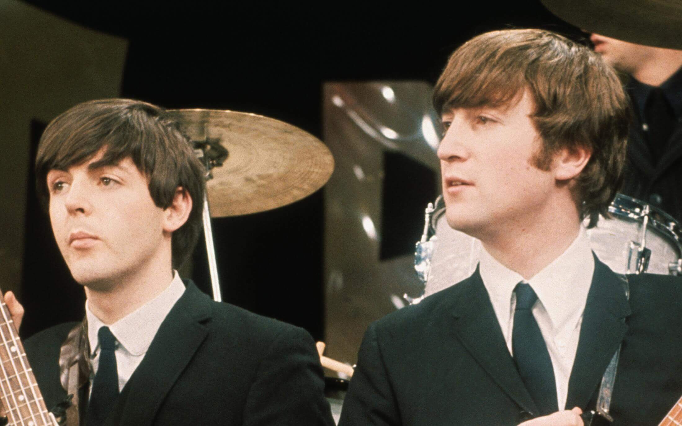 Paul McCartney and John Lennon in suits during The Beatles' "In My Life" era