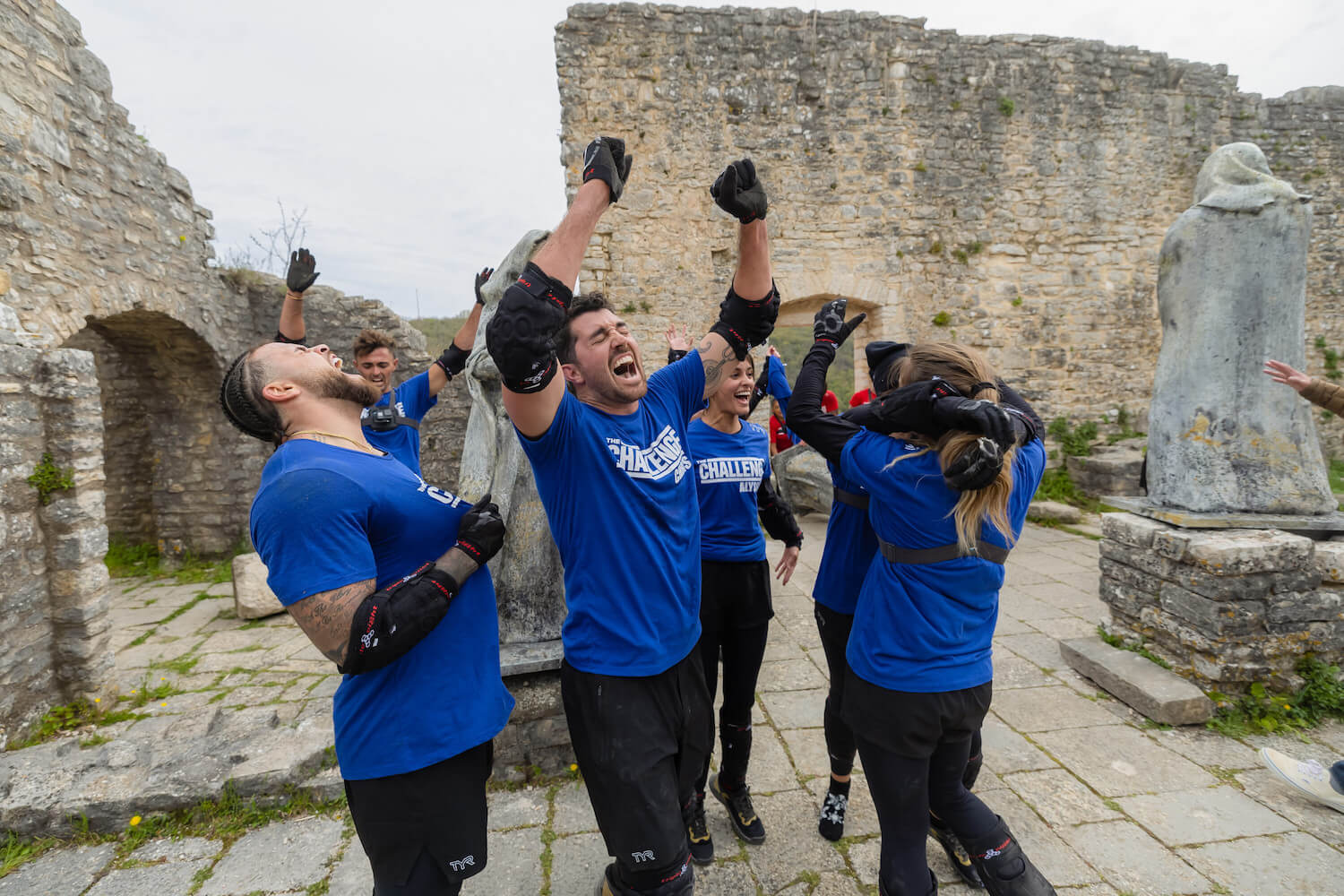The blue team screaming after a win in 'The Challenge: USA' Season 2