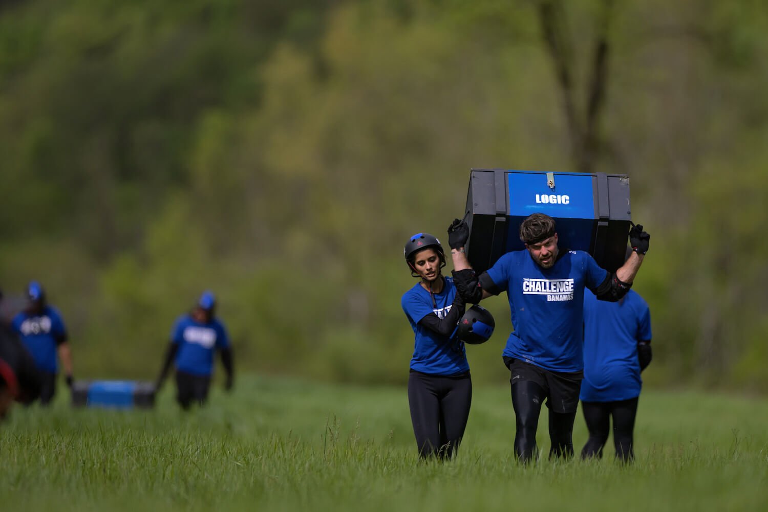 The Blue team competing in a daily competition in 'The Challenge: USA' Season 2 Week 3