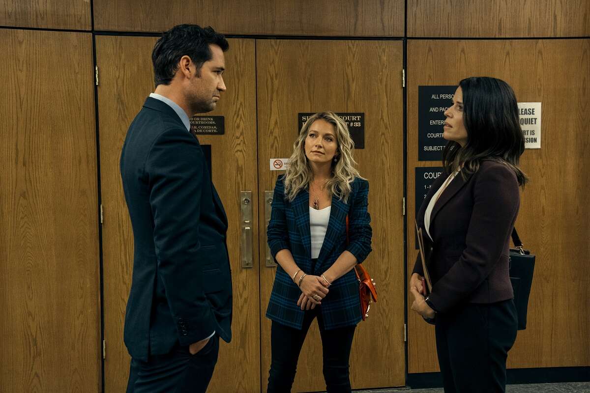 Manuel Garcia-Rulfo as Mickey Haller, Becki Newton as Lorna, Neve Campbell as Maggie McPherson in 'The Lincoln Lawyer'
