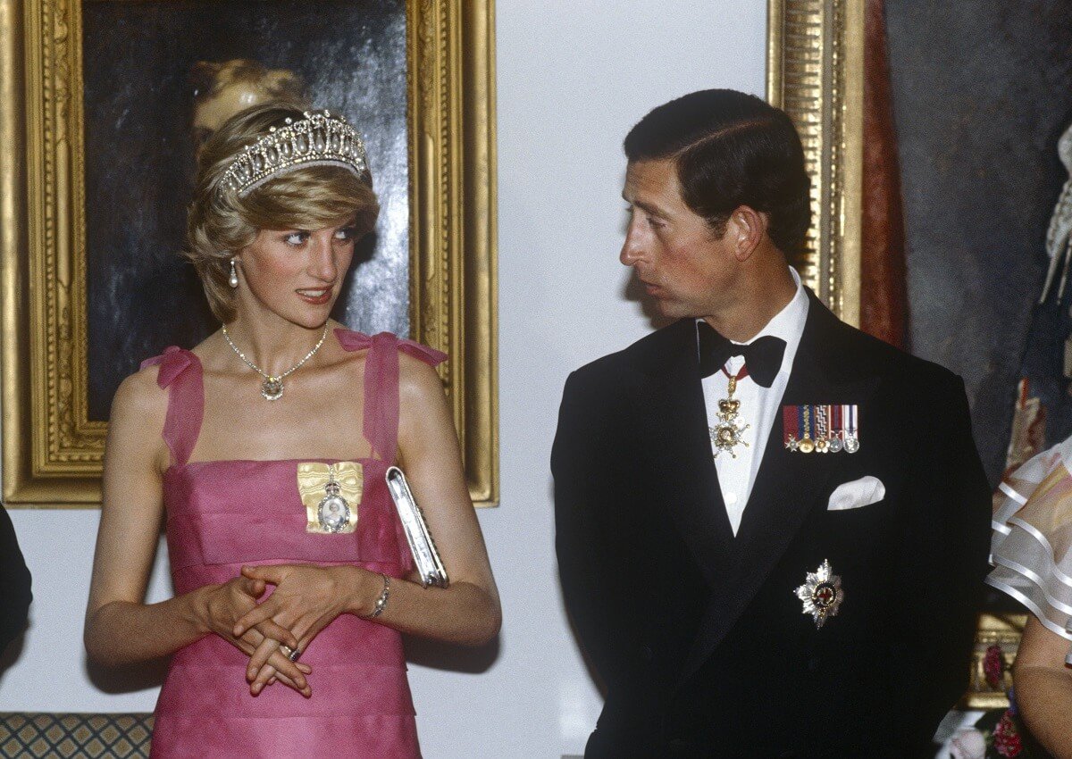 Then-Prince Charles, who made a joke in unearthed clip about having two wives, and Princess Diana at a reception in Canada (circa 1983)