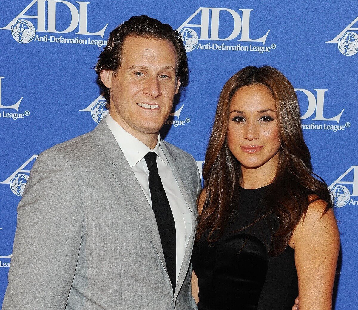 Trevor Engelson and Meghan Markle, who lived in an LA house with her ex-husband that was in location with a connection to Prince William and Kate, at the Anti-Defamation League Entertainment Industry Awards Dinner (2)