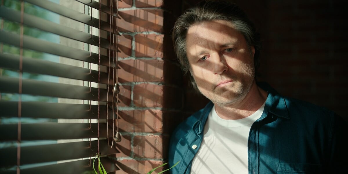 Jack (Martin Henderson) in 'Virgin River' Season 5 with shadows across his face